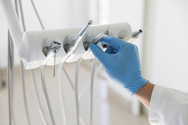 Professional Dental Veneers technician working in Aquebogue, NY
